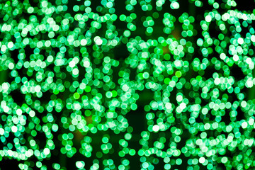 Blur bokeh green unfocused Christmas lights background