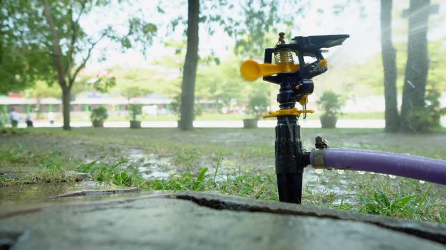 Garden irrigation spray system watering lawn
