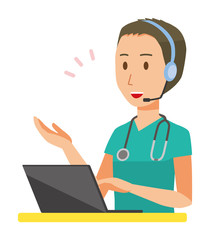 A male doctor wearing a green scrub is talking on the headset