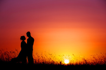 Fototapeta na wymiar wedding couple with the sunset