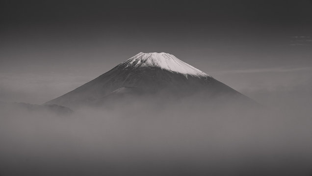 Fototapeta Top of Mt.Fuji with fog in autumn season morning , process in black and white tone