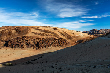 Teide National Park, Tenerife, Canary Islands - colourful soil of the Montana Blanca volcanic ascent trail. This scenic hiking path leads up to the 3718 m Teide Peak, the highest peak in Spain