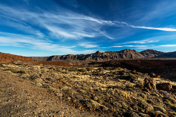 Teide National Park, Tenerife, Canary Islands - colourful soil of the Montana Blanca volcanic ascent trail. This scenic hiking path leads up to the 3718 m Teide Peak, the highest peak in Spain