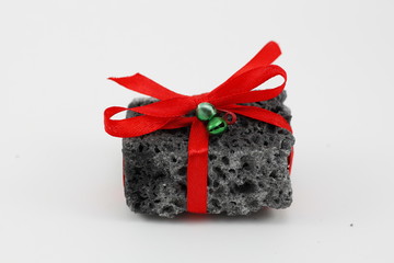Christmas coal in a white background
