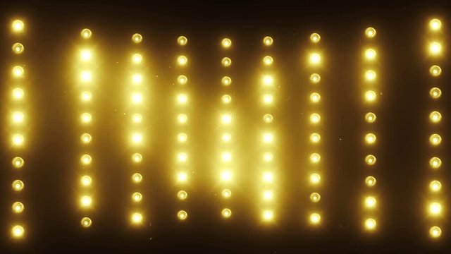 A wall of light projectors, a flash of light