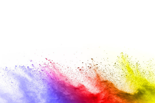 abstract multicolored powder splatted on white background,Freeze motion of color powder exploding. © kitsana