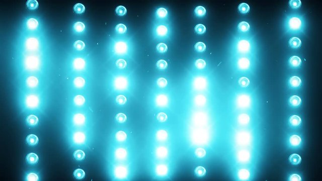 A wall of light projectors, a flash of light