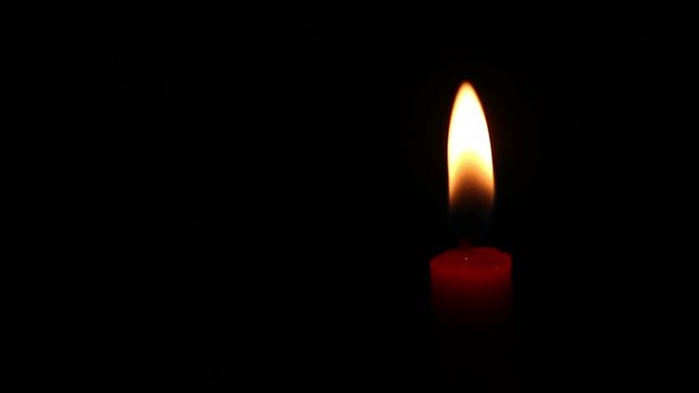 candle light on isolated black