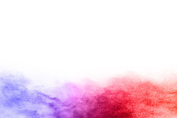 abstract multicolored powder splatted on white background,Freeze motion of color powder exploding.