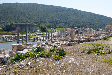 Fototapeta na wymiar Colonnaded street, ruins of ancient Patara, Antalya Province, Turkey.