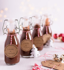 Chocolate liquor in little glass bottles. Idea for Christmas drinks, homemade and wrapped with...