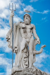 Naklejka premium Statue of Neptune at the fountain of Neptune, Piazza del Popolo, Rome, Italy