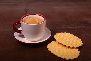 Wafel, caramel waffle and coffee cup, coffeebreak isolated on dark background