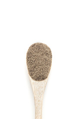 Ground black Pepper spices in wooden spoon isolated on white bac