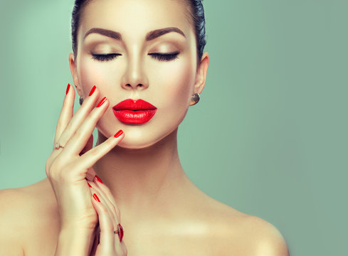 Beautiful Fashion Sexy Woman With Red Lipstick And Red Nails