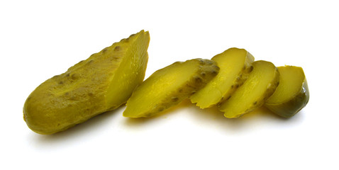 Sliced fermented cucumber on white background