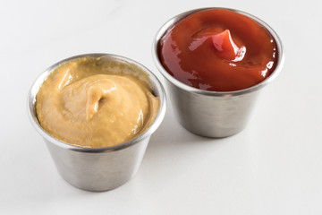 Ketchup and Mustard in Condiment Cups