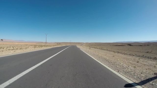 POV Driving through Morocco in abandoned desert  landscape – 4K