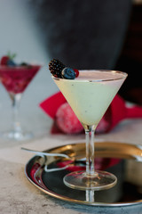 Sweet mousse dessert with berries in a glass