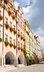 Town hall square with historic houses in the town Jelenia Gora German( Hirschberg), Lower Silesia, Poland