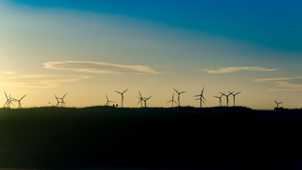 Landscape with windmills farm for clean energy