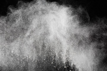 White powder. Grainy abstract texture on black background.