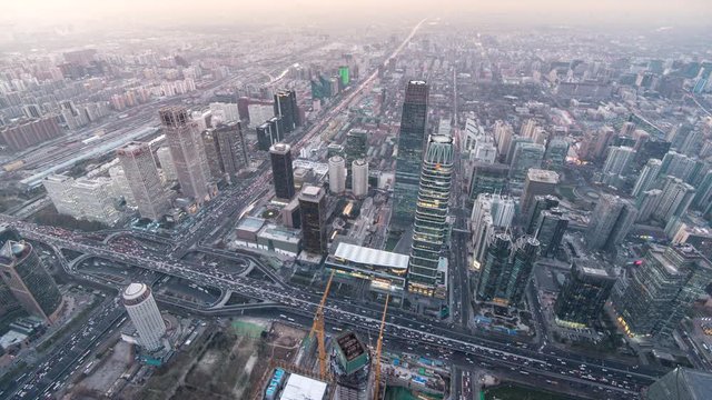 Timelapse. Aerial View of City Skyscrapers and Traffic Flow at Sunset,Beijing,China.