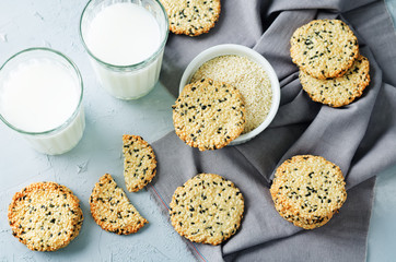Sesame cookies with glasses of milk