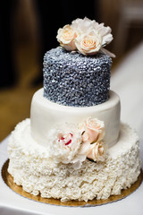Multilevel wedding cake with flowers