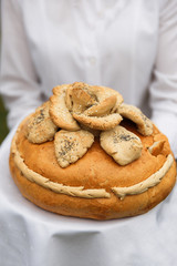Wedding bread from wheat flour dough on the plate