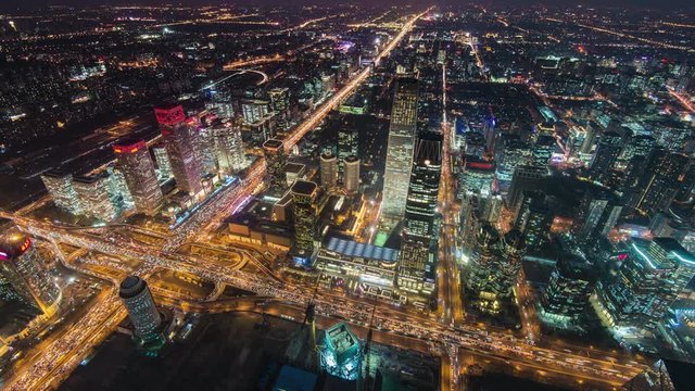 Timelapse.Aerial View of City Skyscrapers and Traffic Flow at Night,Beijing,China.