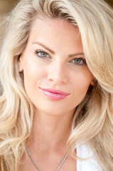 Head shot of a beautiful blond haired women.