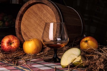 Still life with alcohol and apples - obrazy, fototapety, plakaty