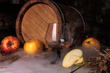 Still life with alcohol and apples