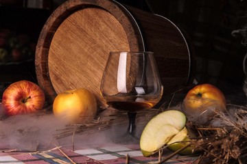 Still life with alcohol and apples