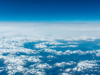 Naklejka na ściany i meble Beautiful aerial landscape view. mountain view from airplane