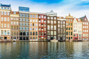 Canal houses of Amsterdam, Netherlands. Traditional old buildings in Amsterdam