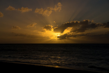 Sunset over the Atlantic Ocean from the sand beach of Boa Vista, Cape Verde