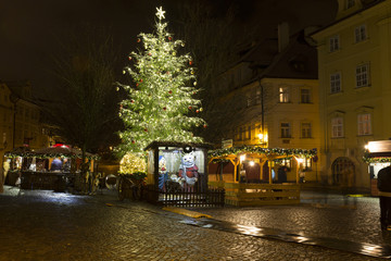 Obraz premium Christmas Mood on the snowy night historical Island Kampa, Prague, Czech Republic