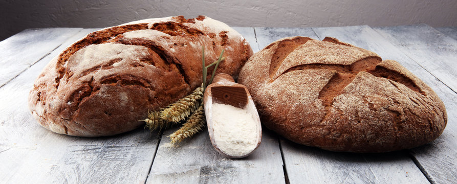 Freshly baked bread and flour in a bakery concept set.