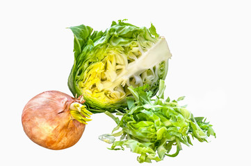 Green cabbage half a head of shredded strips of lettuce on white background isolated.