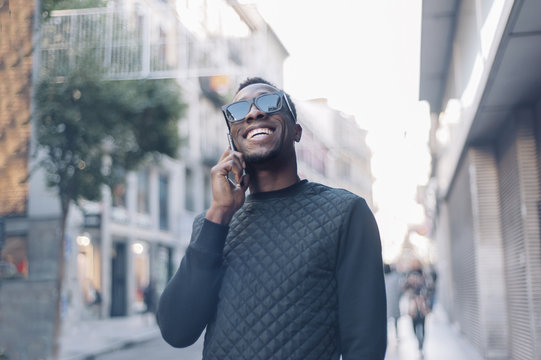 Attractive African American Man Using Telephone