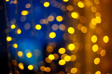 Yellow bokeh on a blue background.