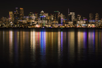 Fototapeta na wymiar Seattle skyline at night reflecting in Lake Washington
