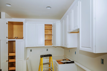 Custom kitchen cabinets of installation base for island in center