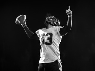 american football player celebrating after scoring a touchdown
