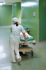 nurse moves patient