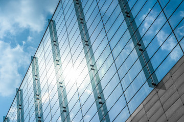 Modern office building against blue sky