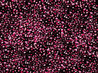 pink hearts in a random order on black background