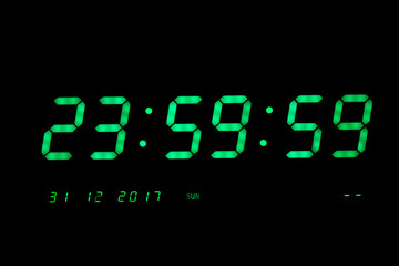 Green Digital LED Clock Showing The Last Second of year 2017 on Black Background.